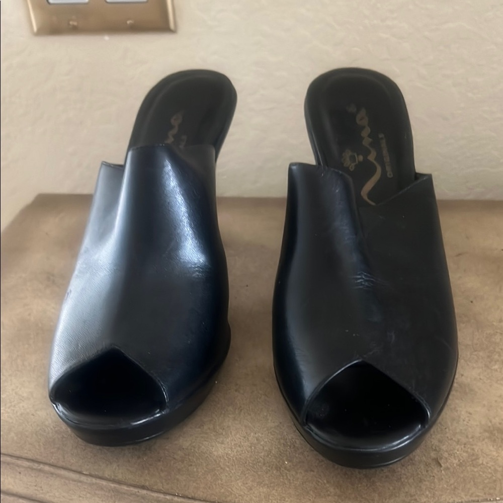 Nina Black Mules & Clogs with Peep-Toe Design